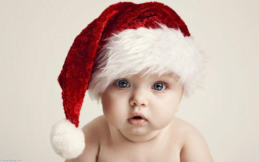 عکس با کیفیت پسر بچه خوشگل با کلاه بابانوئل